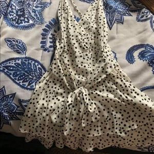 Worn once, bow ties in front, size large.